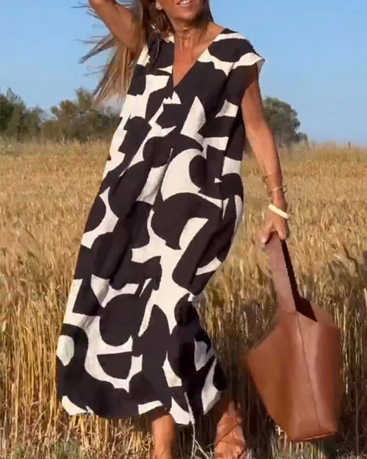 SITA™ | Vestito Elegante con Stampa e Scollatura a V