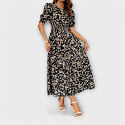 Amelia™ – Vestido com Decote Redondo e Padrão Floral